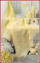 You Are My Sunshine baby afghan and nursery set, including musical bottle cover.